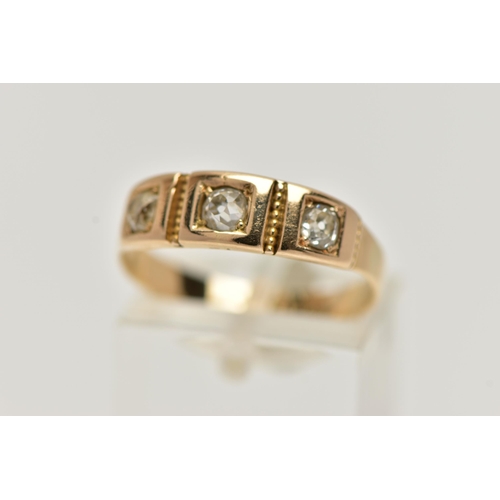 6 - A YELLOW METAL THREE STONE DIAMOND RING, set with three old cut diamonds, each four claw set in a sq... 