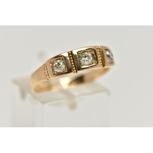 6 - A YELLOW METAL THREE STONE DIAMOND RING, set with three old cut diamonds, each four claw set in a sq... 