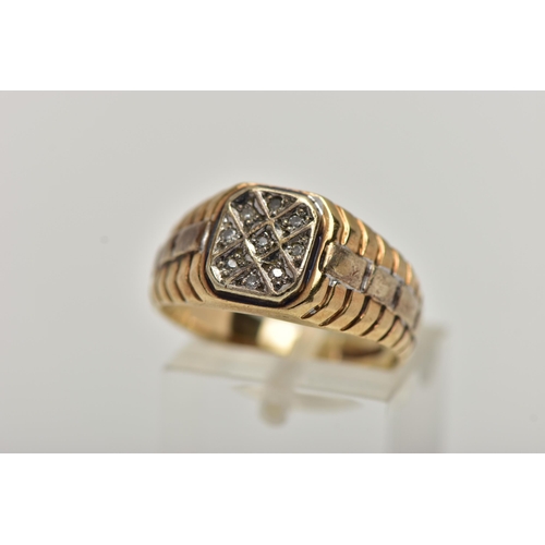 70 - A 9CT GOLD DIAMOND SIGNET RING, of a square outline, set with nine single cut diamonds, estimated to... 