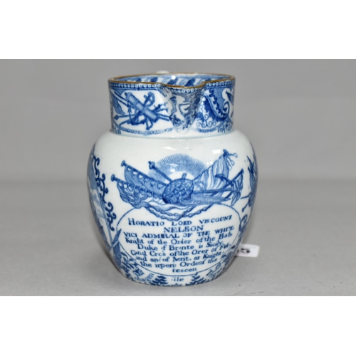 345 - NELSON INTEREST - AN EARLY 19TH CENTURY PEARLWARE BLUE AND WHITE COMMEMORATIVE JUG, brown painted ri... 