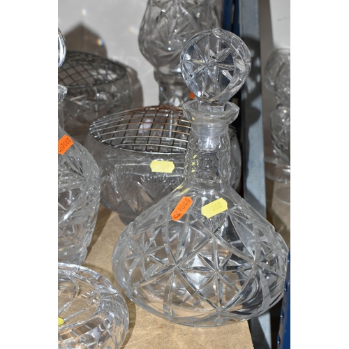 360 - A GROUP OF CUT GLASS, comprising three decanters, two rose bowls, a table lamp, bon-bon dish, ashtra... 