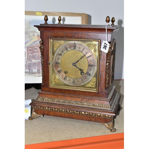 367 - A GERMAN OAK CASED LENZKIRCH MANTEL CLOCK, with key and pendulum, brass face with a silvered chapter... 