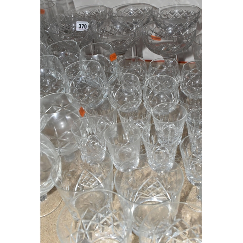 370 - A LARGE QUANTITY OF CUT GLASS, comprising six Edinburgh Crystal wine glasses, six cross cut stemmed ... 