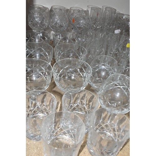 370 - A LARGE QUANTITY OF CUT GLASS, comprising six Edinburgh Crystal wine glasses, six cross cut stemmed ... 