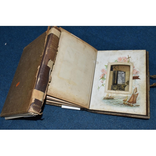 427 - A VICTORIAN PHOTOGRAPH ALBUM / MUSICAL BOX  in working order with key, leather -bound, brass clasped... 