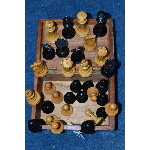 428 - A BOXED SET OF EBONY AND BOXWOOD CHESS PIECES, c1900, weighted pieces, one knight and one rook from ... 