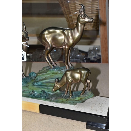 435 - A LARGE FRENCH ART DECO FIGURAL GROUP, of three deer on a hillside, cold painted metal on a black an... 