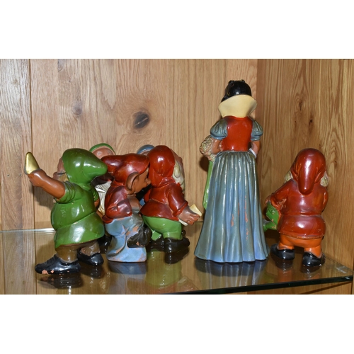 449 - A VINTAGE TERRACOTTA PART SET OF SNOW WHITE AND SIX OF THE DWARFS, hollow slip cast painted figures ... 