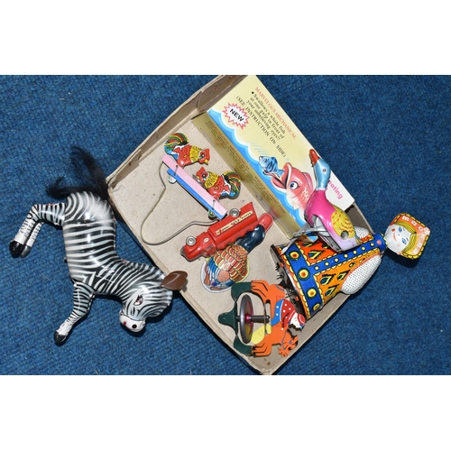 474 - ONE SMALL BOX OF PLATED TOYS, to include a Russian Moscow Olympics souvenir dancing doll produced fo... 