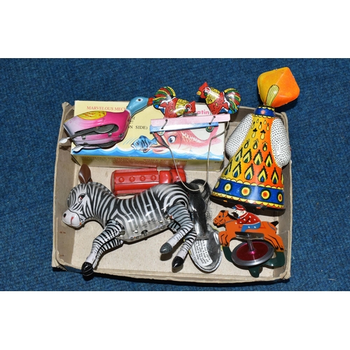 474 - ONE SMALL BOX OF PLATED TOYS, to include a Russian Moscow Olympics souvenir dancing doll produced fo... 