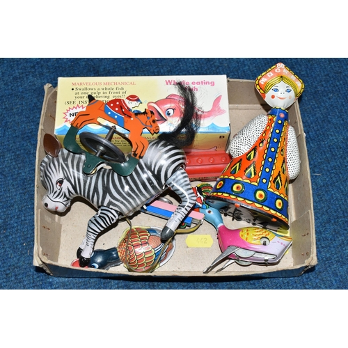 474 - ONE SMALL BOX OF PLATED TOYS, to include a Russian Moscow Olympics souvenir dancing doll produced fo... 