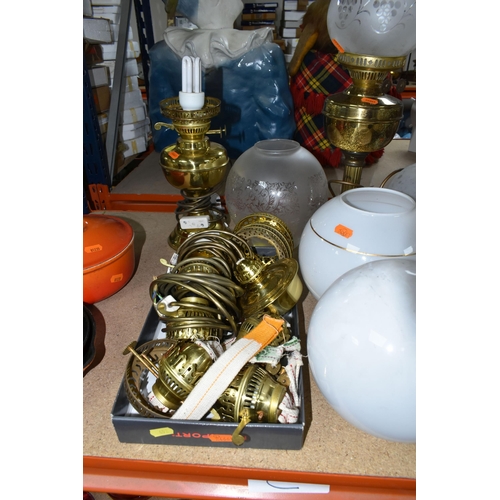 492 - A QUANTITY OF LAMPS AND SHADES, oil lamps and electric table lamps, to include a tall Duplex oil lam... 