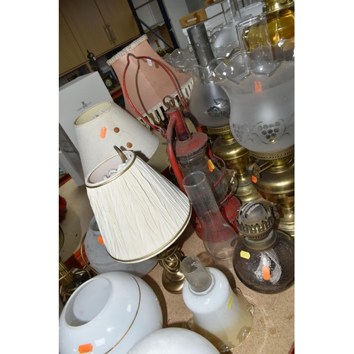 492 - A QUANTITY OF LAMPS AND SHADES, oil lamps and electric table lamps, to include a tall Duplex oil lam... 