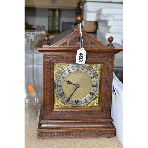 493 - A MANTEL CLOCK AND VARIOUS WOODEN BOXES, comprising a wooden cased mantel clock, carved with floral ... 