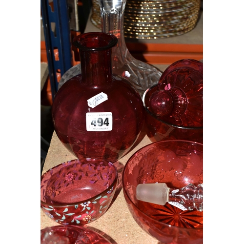 494 - A GROUP OF CRANBERRY GLASS, AND OTHER GLASS WARES, to include a cranberry and clear ribbed glass bow... 