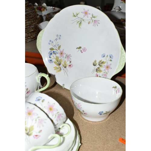 495 - A TWENTY ONE PIECE SHELLEY 'WILD ANEMONE' TEA SET, pattern 13977, comprising a cake plate, a cream j... 