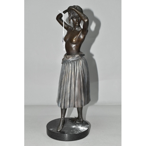 528 - A PATINATED BRONZE FIGURE OF A BALLERINA, height 36cm, a partially clad young woman fixing her hair ... 