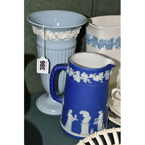 386 - A GROUP OF WEDGWOOD CERAMICS, to include a creamware basket (sd, repair and loss), two Embossed Quee... 