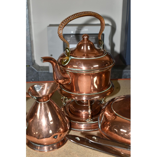 411 - A COLLECTION OF COPPERWARE AND BRASS, comprising a copper spirit kettle with a wicker handle, large ... 