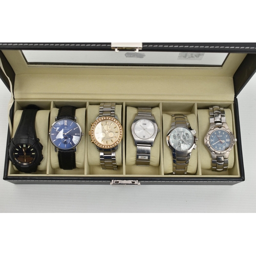 A WATCH DISPLAY CASE WITH SIX WRISTWATCHES, to include a 'Casio HD