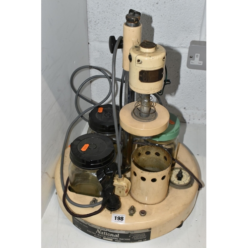 A 'NATIONAL ELECTRIC WATCH CLEANING MACHINE' British made, model number