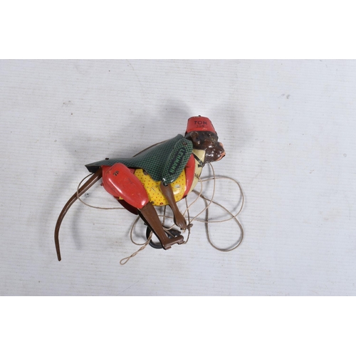 23 - A LEHMANN CLOCKWORK TINPLATE 'TOM 385' CLIMBING MONKEY, not tested, with a German clockwork tinplate... 