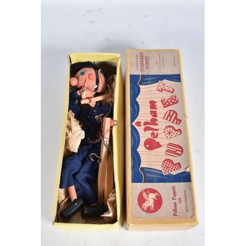 54 - FOUR BOXED PELHAM PUPPETS, SL Giant, SL Guitar Player and two SM6 Policeman, all appear complete and... 