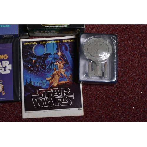 6 - A COLLECTION OF STAR WARS COLLECTABLES, VHS, FIGURES AND GAMES, to include a sealed Star wars Trilog... 