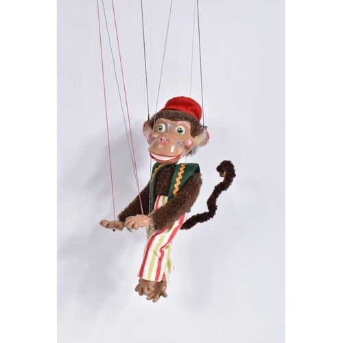 67 - A BOXED PELHAM SL MONKEY PUPPET, appears complete and in good condition with only minor marking and ... 