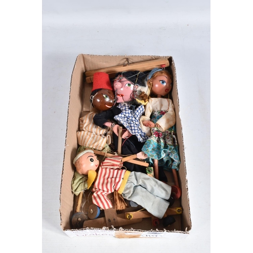 70 - A QUANTITY OF ASSORTED UNBOXED PELHAM PUPPETS, to include an SS Boy, SS Dutch Boy and Girl, SS Mitzi... 