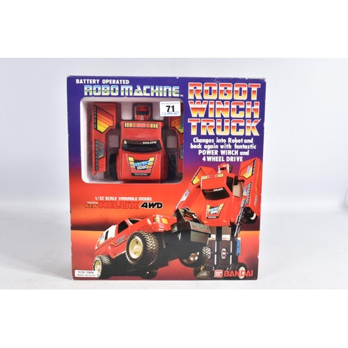 71 - A BOXED BANDAI ROBO MACHINE BATTERY OPERATED ROBOT WINCH TRUCK, No.0503211, not tested, with three o... 