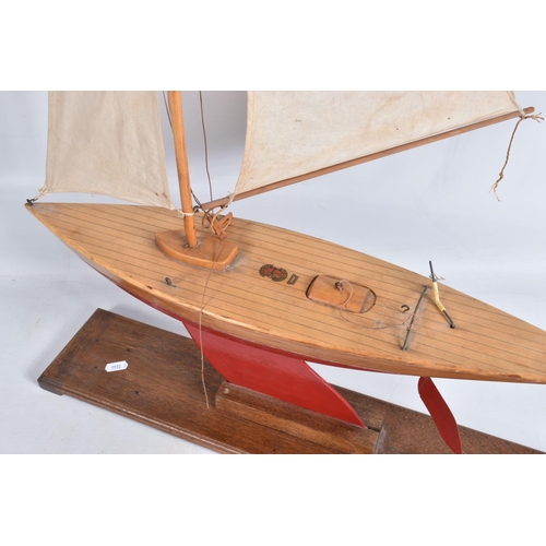 97 - TWO MID-20th CENTURY MODEL BOWMAN POND RACING YACHTS, the first a Bowman 'Gull' boat, painted sky bl... 