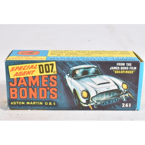 99 - A BOXED CORGI TOYS JAMES BOND ASTON MARTIN D.B.5. No.261, working features and suspension, complete ... 