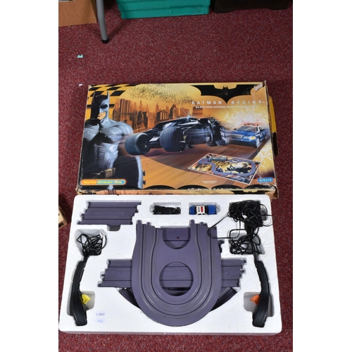 143 - A BOXED MICRO SCALEXTRIC BATMAN BEGINS SLOT RACING SET, No.G1026, appears complete and in good condi... 