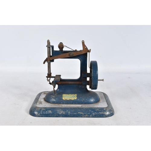 144 - A QUANTITY OF ASSORTED CHILDS MICROSCOPES AND SEWING MACHINES, to include Britex Naturalist microsco... 