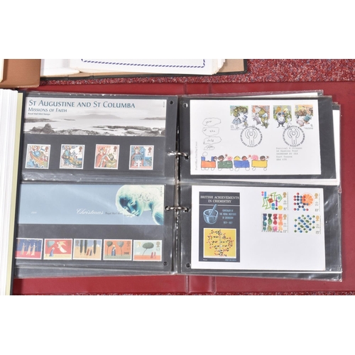 205 - COLLECTION OF STAMPS IN FOUR ALBUMS, we note GB presentation packs and a GB QE2 mint and used collec... 