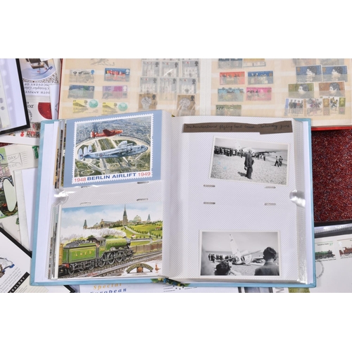 213 - LARGE COLLECTION OF GB FDCS AND STAMPS IN ALBUMS AND LOOSE, we note a couple of year books, mint GB ... 