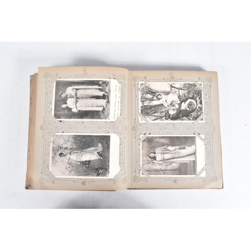 231 - POSTCARDS, three albums containing approximately 597* early 20th century Postcards (Edwardian - 1930... 