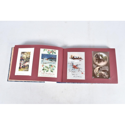 240 - POSTCARDS, two albums containing approximately 417* early 20th century CHRISTMAS Postcards (Edwardia... 