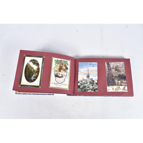 240 - POSTCARDS, two albums containing approximately 417* early 20th century CHRISTMAS Postcards (Edwardia... 