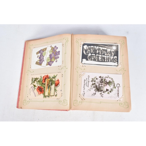 240 - POSTCARDS, two albums containing approximately 417* early 20th century CHRISTMAS Postcards (Edwardia... 