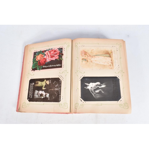 240 - POSTCARDS, two albums containing approximately 417* early 20th century CHRISTMAS Postcards (Edwardia... 