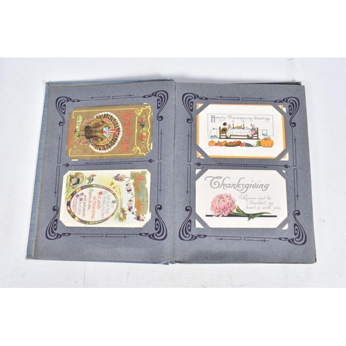 244 - POSTCARDS, four albums containing approximately 380* early 20th century postcards (Edwardian - 1950'... 