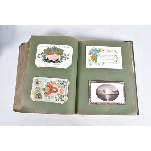 244 - POSTCARDS, four albums containing approximately 380* early 20th century postcards (Edwardian - 1950'... 