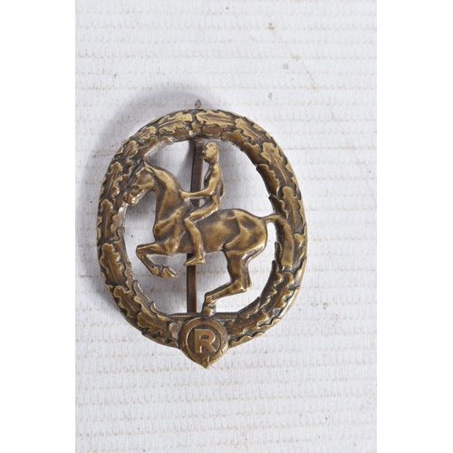 320 - TWO GERMAN EQUESTRIAN PROFICIENCY BADGES, OR KNOWN AS THE GERMAN HORSEMAN'S BADGE, these were a spor... 