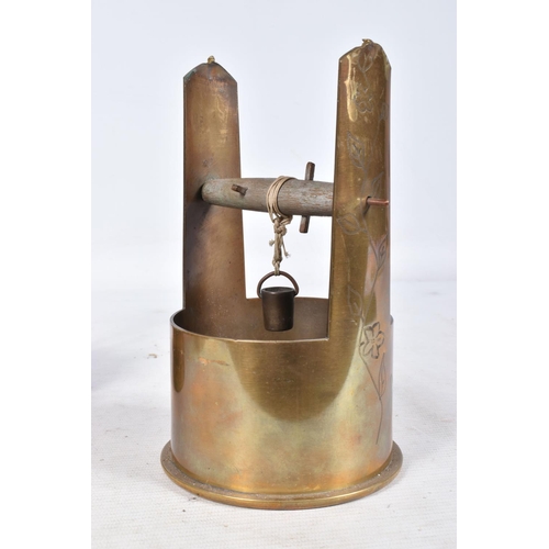 322 - SIX VARIOUS INTERESTING PIECES OF TRENCH ART, these include a 1938 dated wishing well and bucket, th... 