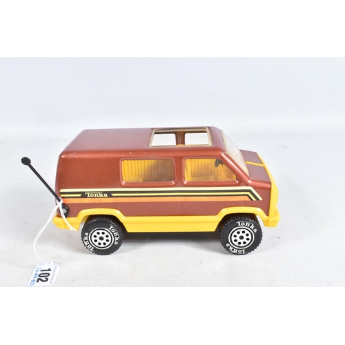 102 - A BOXED TONKA VAN & CAMPER SET / 2002, featuring a bronze coloured van and trailer with yellow detai... 