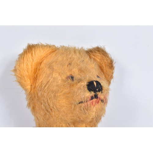 106 - A GOLDEN PLUSH TEDDY BEAR, amber and black plastic eyes, vertically stitched nose, jointed body with... 