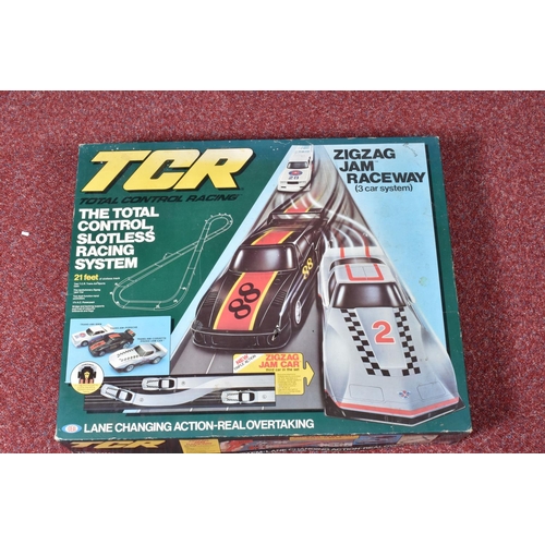 110 - A BOXED TCR ZIGZAG JAM RACEWAY 3 CAR SYSTEM ELECTRIC MODEL RACING TRACK, box in fair condition for a... 