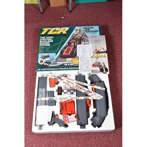 110 - A BOXED TCR ZIGZAG JAM RACEWAY 3 CAR SYSTEM ELECTRIC MODEL RACING TRACK, box in fair condition for a... 